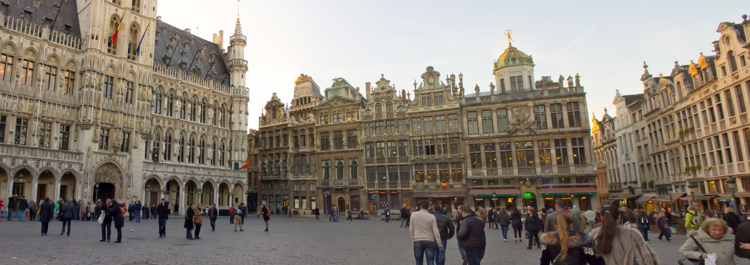The view down Grand Place, with the town hall to the left and guild houses in front