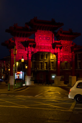 The Chinese arch lit blood red